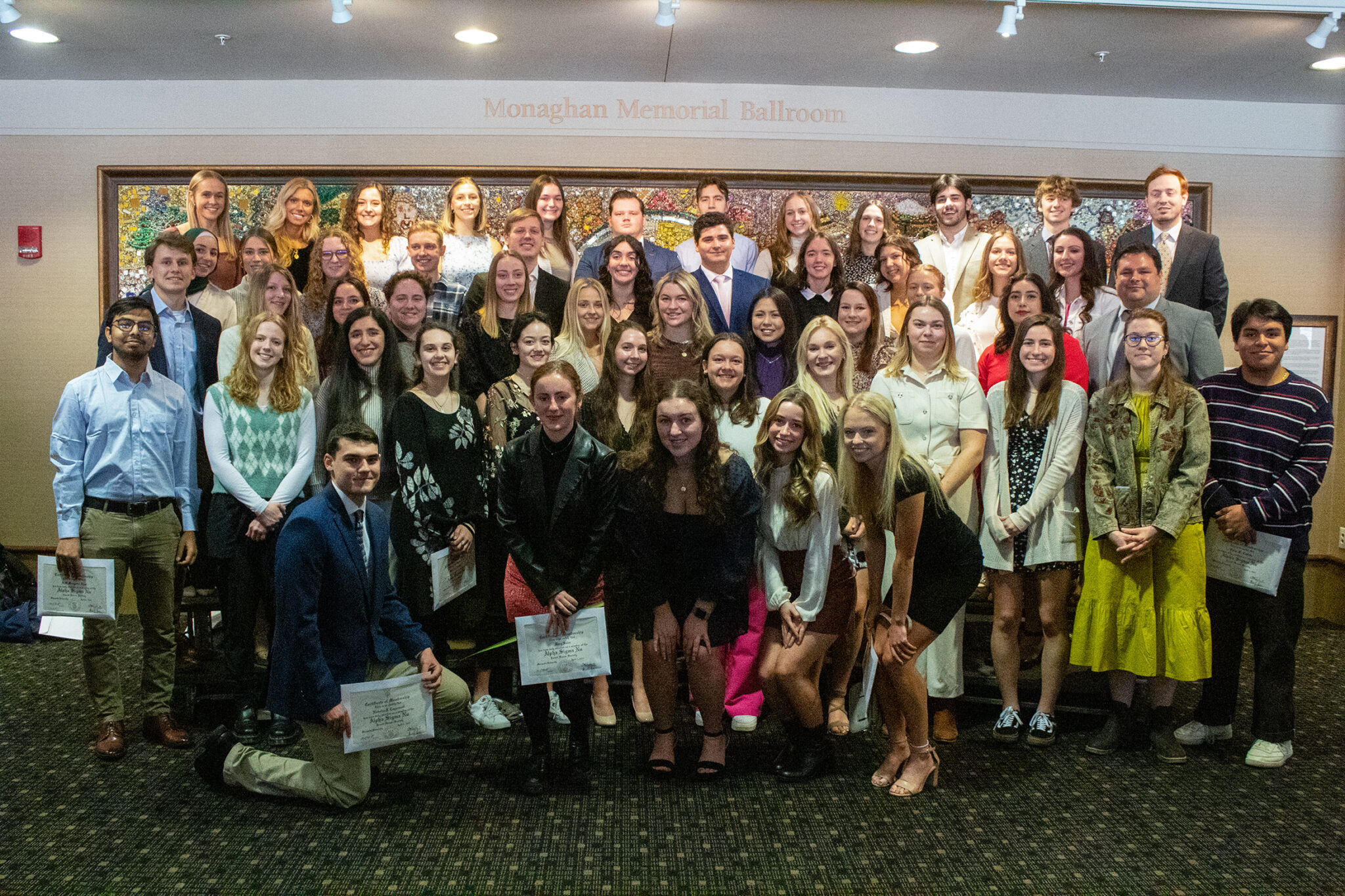 Alpha Sigma Nu inducts 71 new students and six honorary members ...