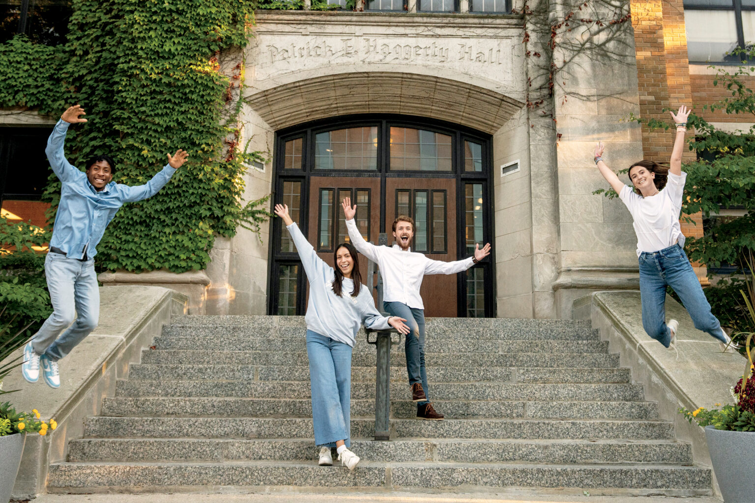 Tour Guides on campus staircase