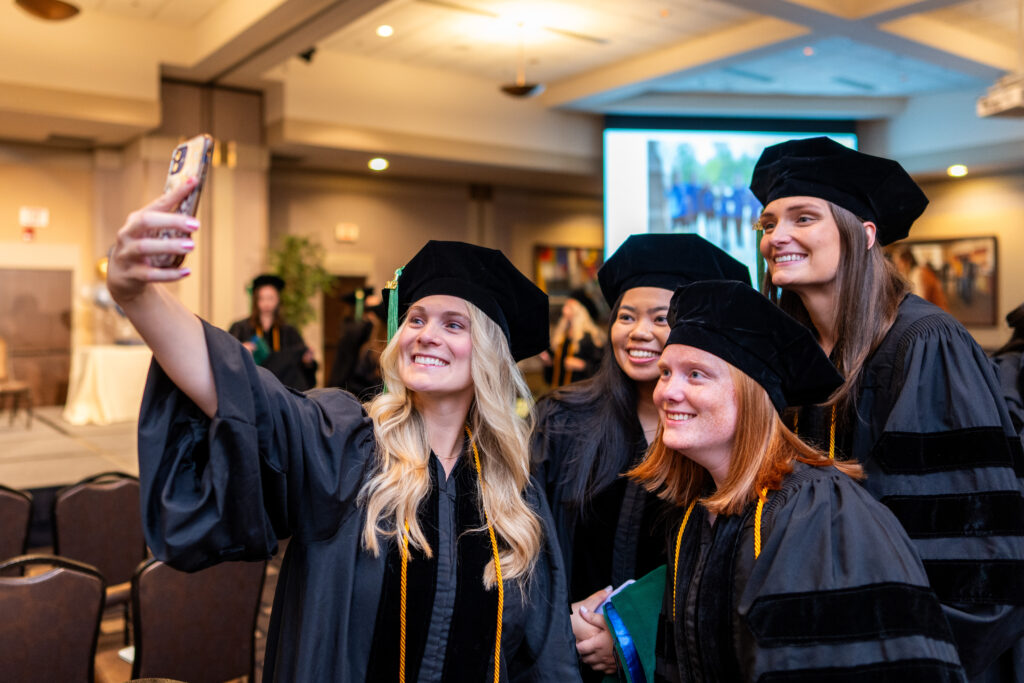 Students taking a selfie.
