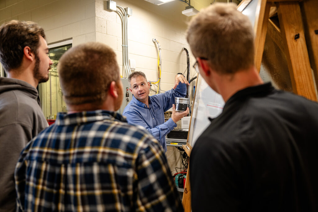 Adam Dempsey, students, and diesel engine hybrids, opus college of engineering