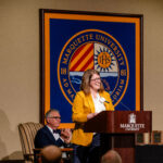 A recipient at last year's Staff Excellence Awards speaks at the podium.