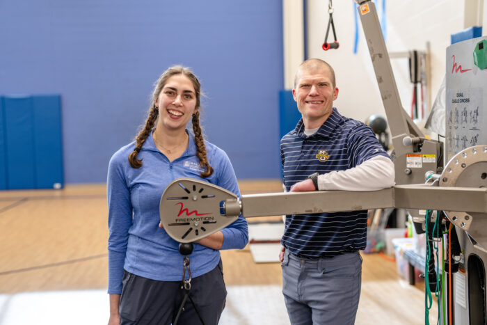Marquette Physical Therapy student Quinn Moceri stands with her preceptor Dr. Brian Butler at Children's Wisconsin.