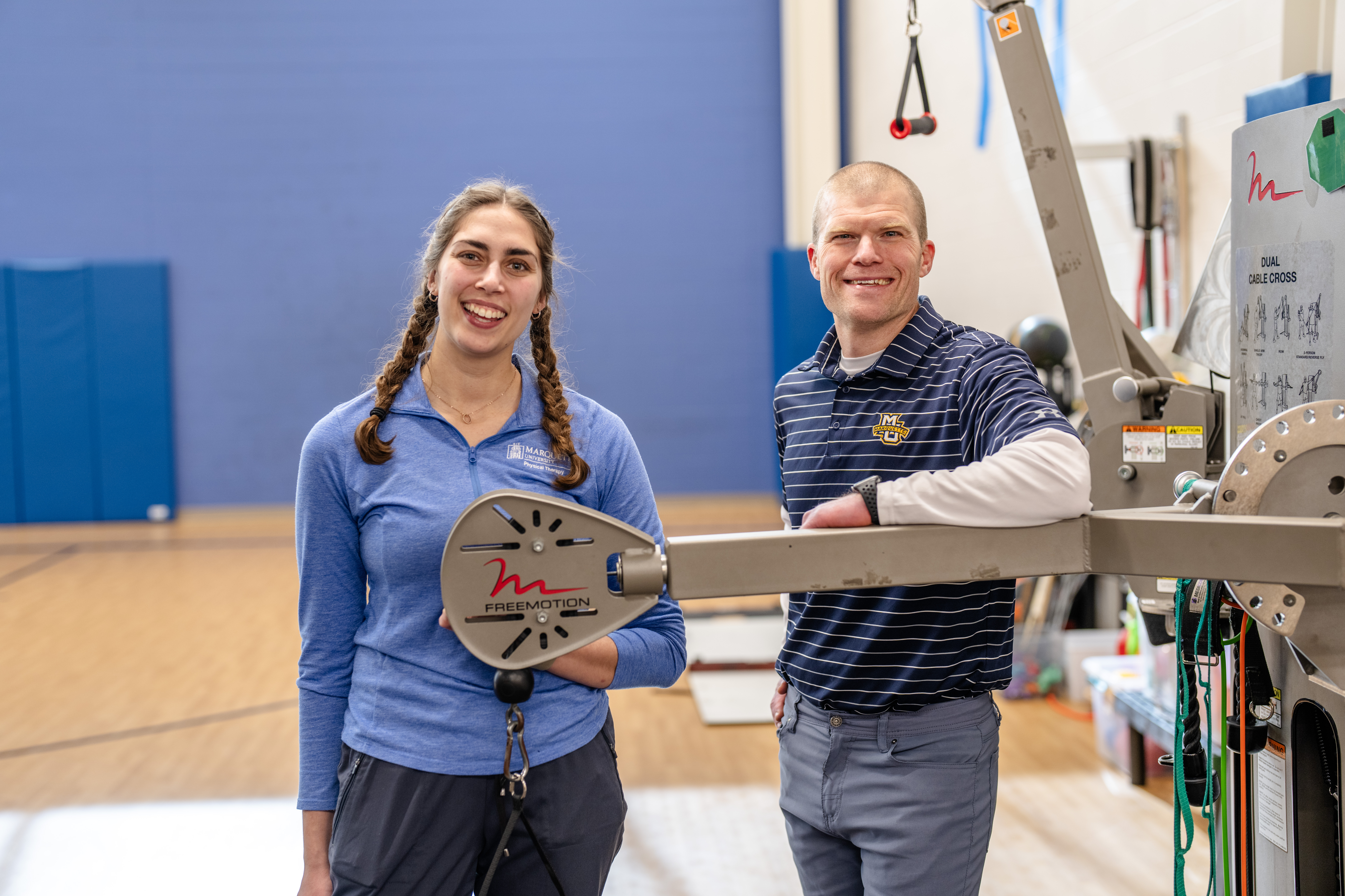 Marquette Physical Therapy student Quinn Moceri stands with her preceptor Dr. Brian Butler at Children's Wisconsin.