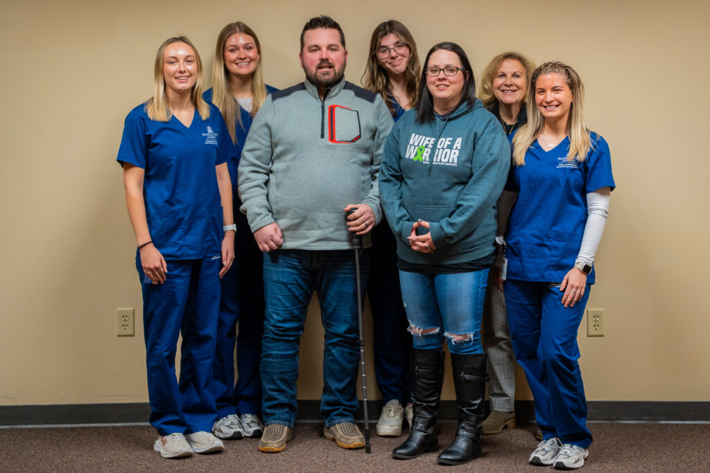 A group of people in the Speech and Hearing Clinic. 