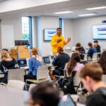 Marquette Business Instructor Manoj Babu instructing class