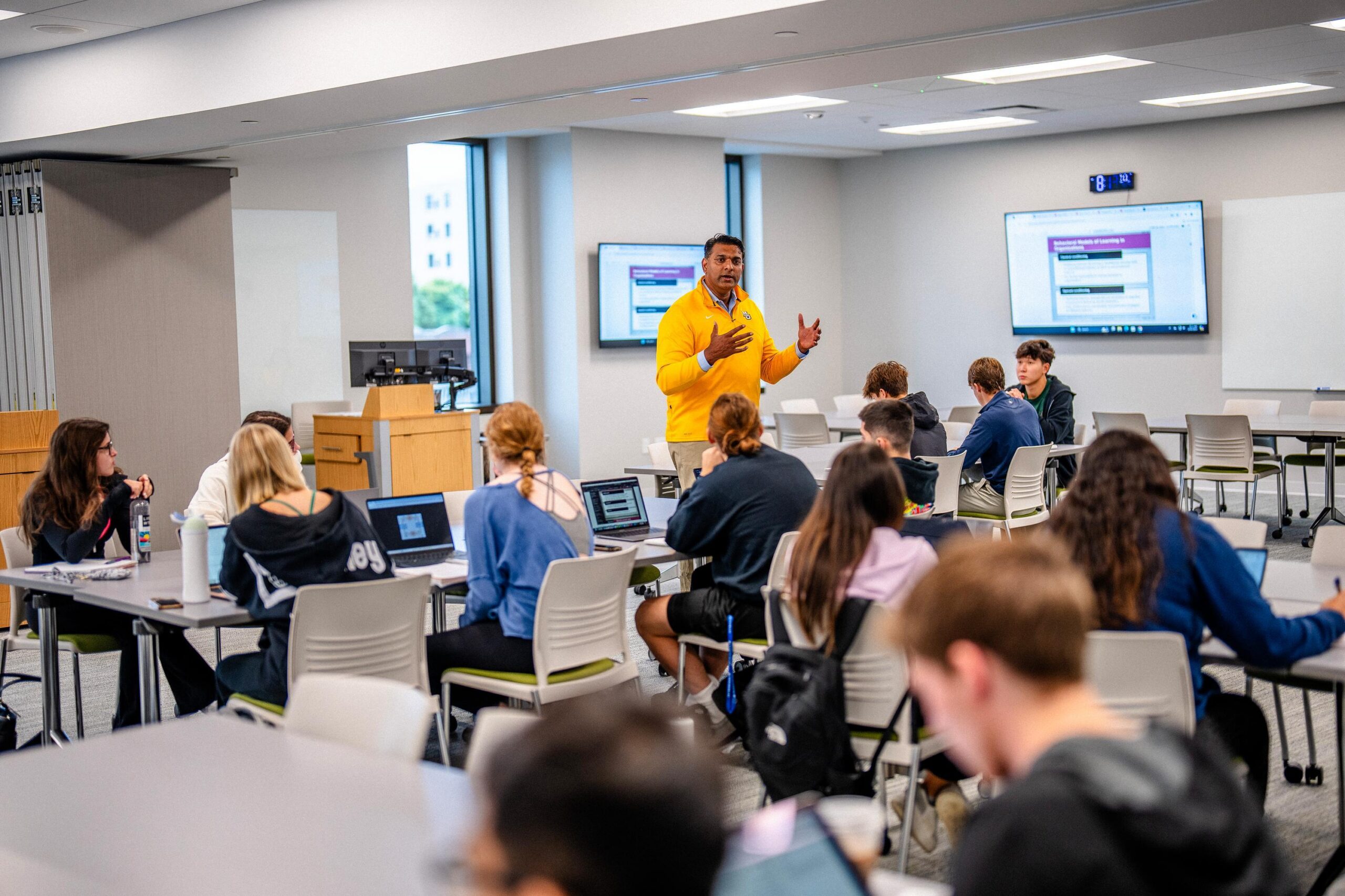 Marquette Business Instructor Manoj Babu instructing class