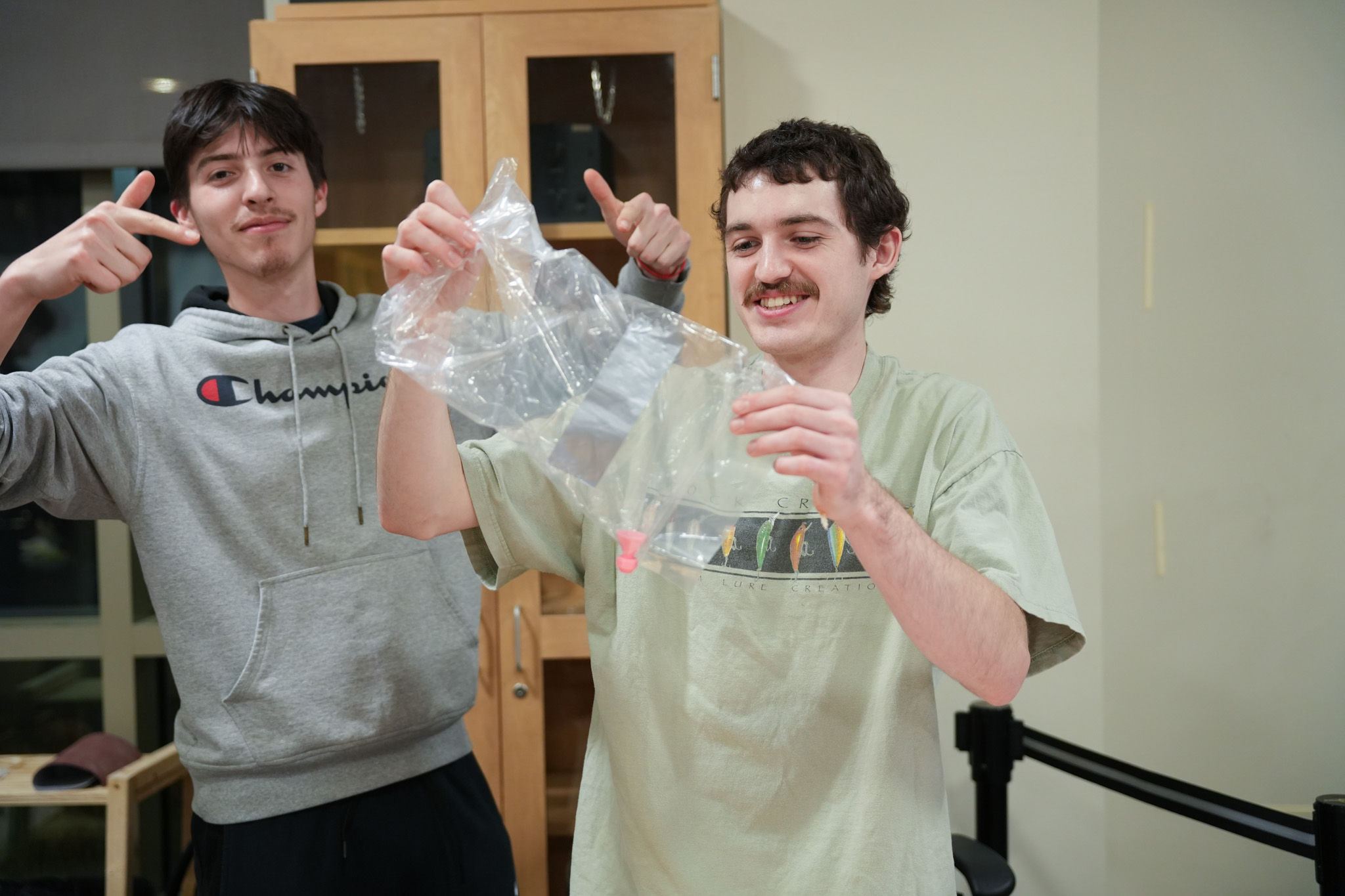 Students collaborating at cake decorating contest