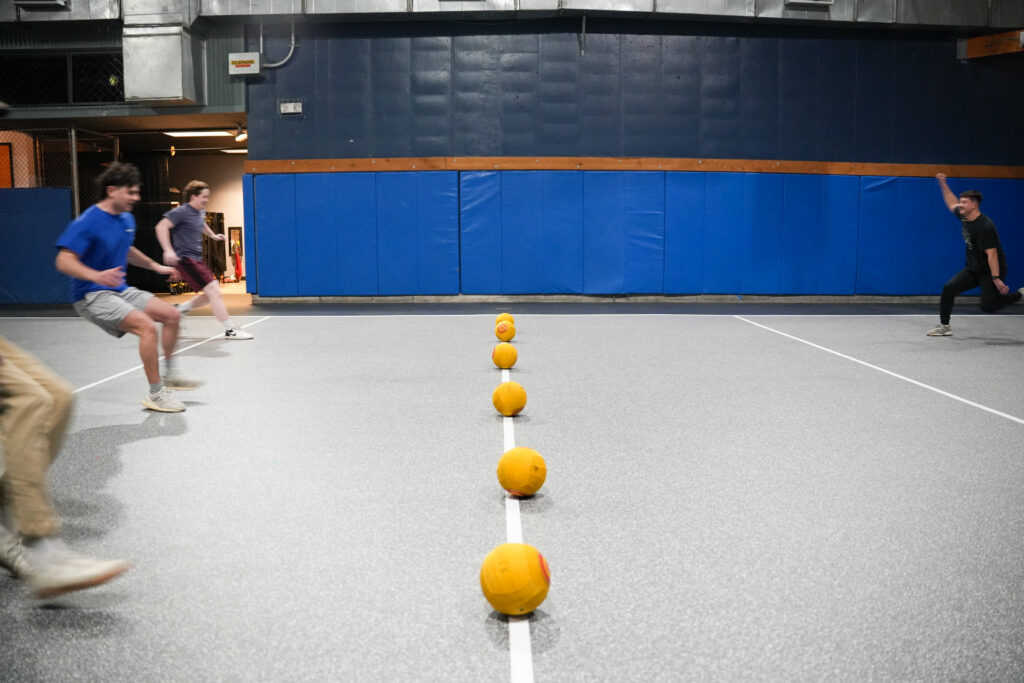 students playing dodgeball at event