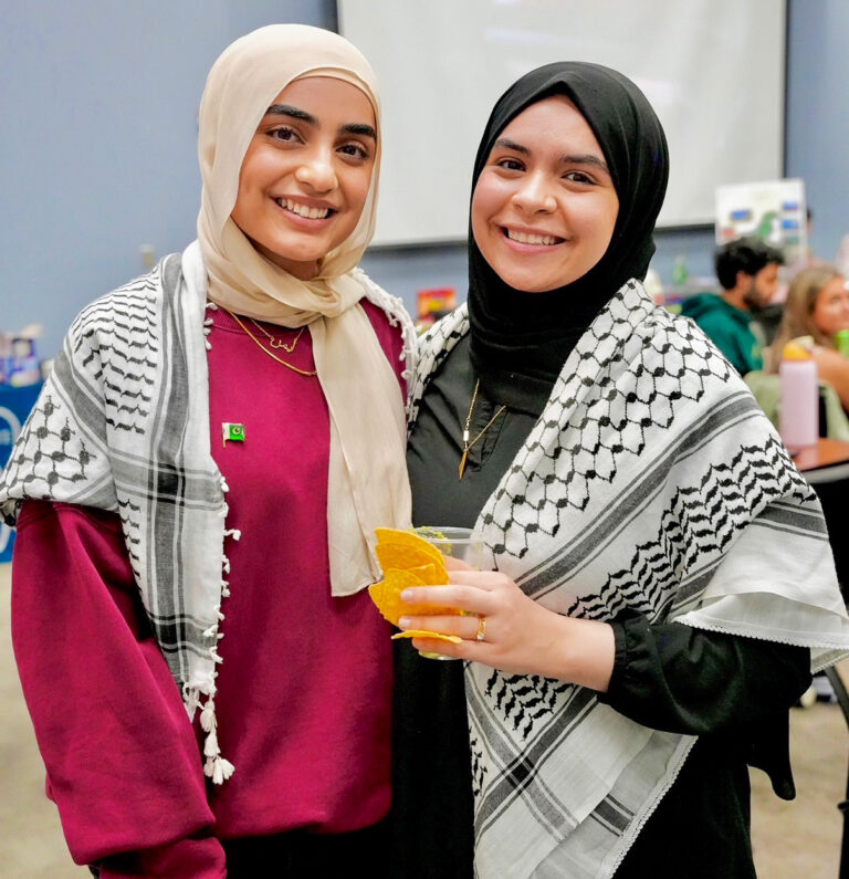 Two women posing for a photo.