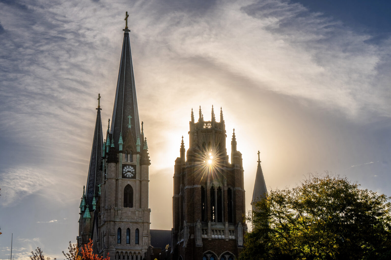 The sun peaking through Marquette Tower.