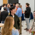 Graduate School of Management students networking at event in O'Brien Hall