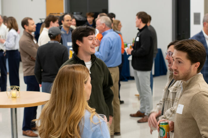 Graduate School of Management students networking at event in O'Brien Hall