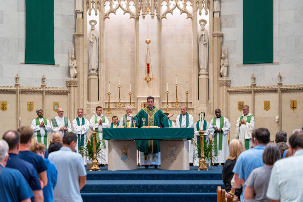 Rev. Nick Albin, S.J., presiding over Mass.